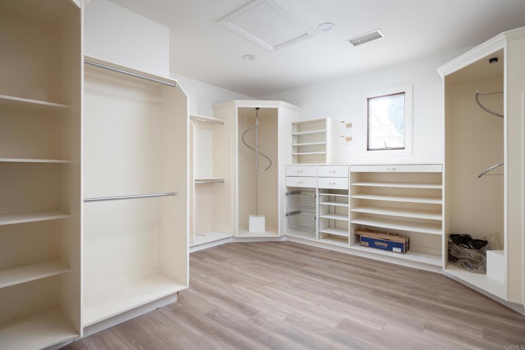 15017 Skyridge Road Poway, CA 92064 - Photo 22 of 54 a view of a livingroom with wooden floor