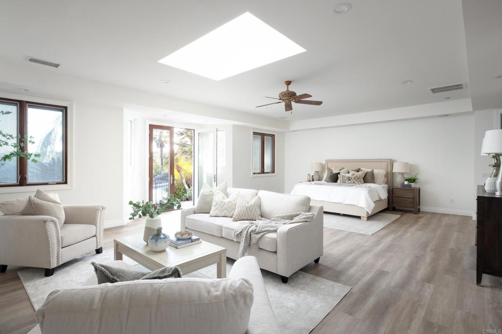 15017 Skyridge Road Poway, CA 92064 - Photo 23 of 54 a living room with furniture and a large window