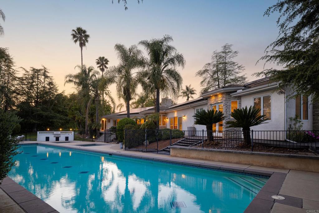 15017 Skyridge Road Poway, CA 92064 - Photo 35 of 54 a house view with swimming pool and sitting space