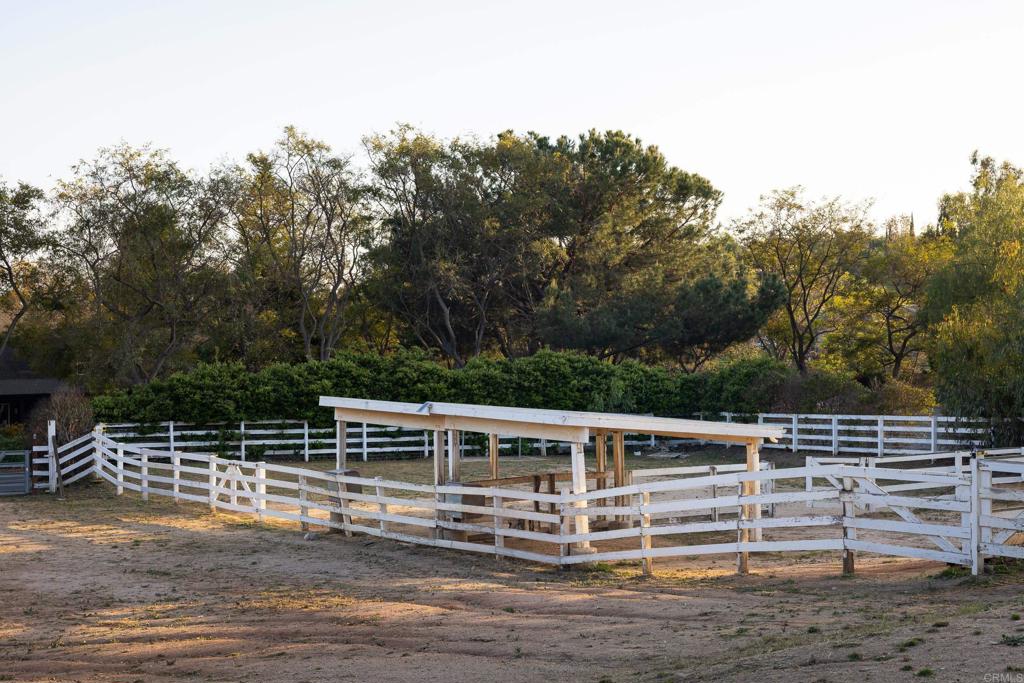 15017 Skyridge Road Poway, CA 92064 - Photo 44 of 54 a view of a house with a backyard