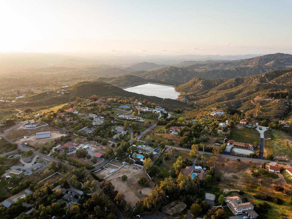15017 Skyridge Road Poway, CA 92064 - Photo 51 of 54 an aerial view of house with yard and mountain view in back