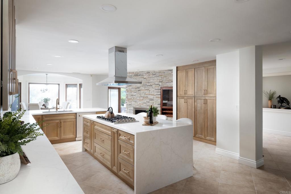 15017 Skyridge Road Poway, CA 92064 - Photo 9 of 54 a kitchen with a sink stove and refrigerator
