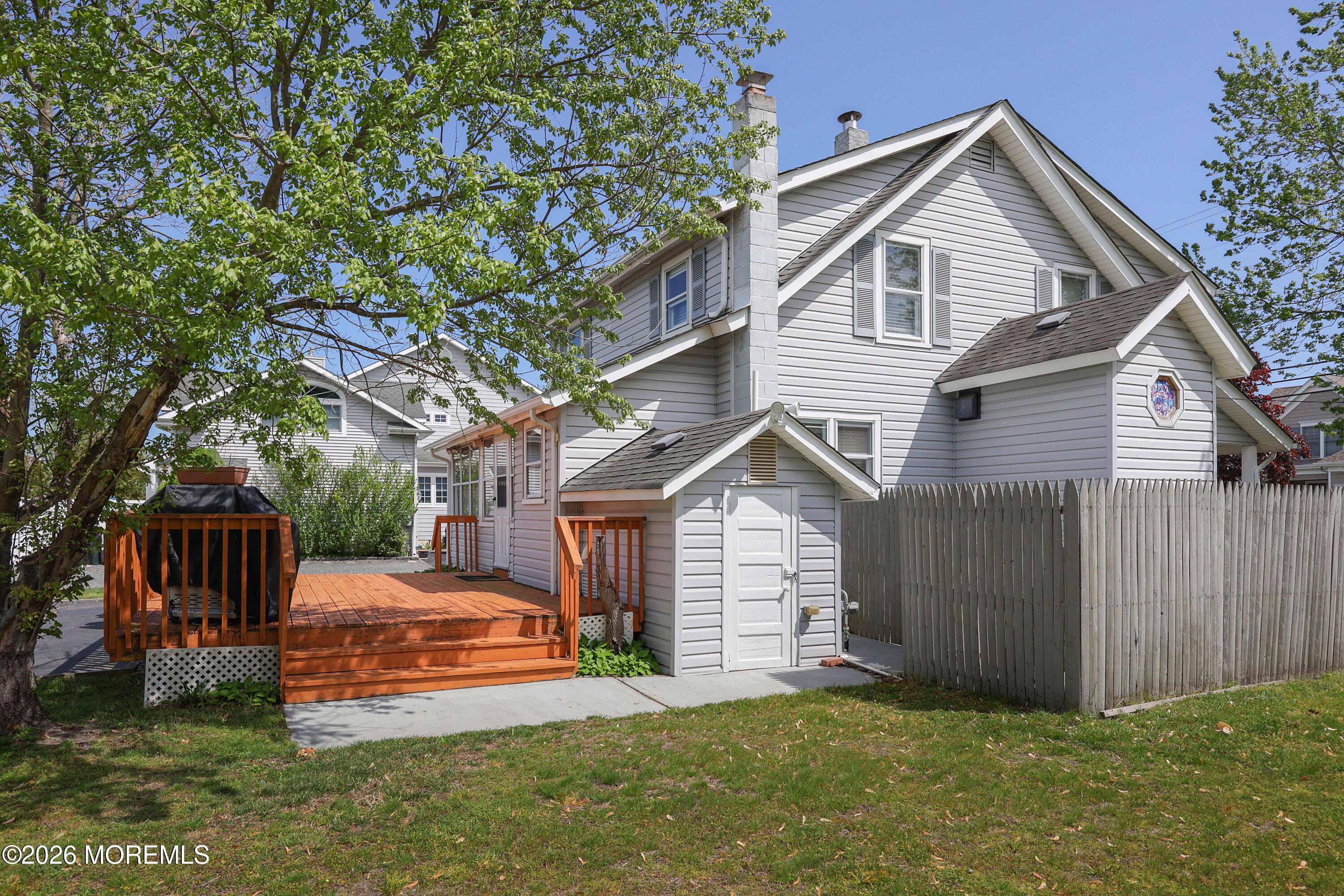 715 Howe Street Point Pleasant, NJ 08742 - Photo 26 of 45 a front view of a house with a yard