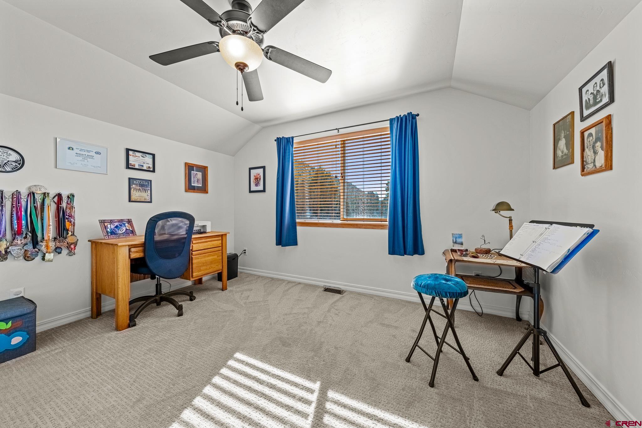 72 Cedar Ridge Way Durango, CO 81301 - Photo 19 of 33 a work room with furniture and a window