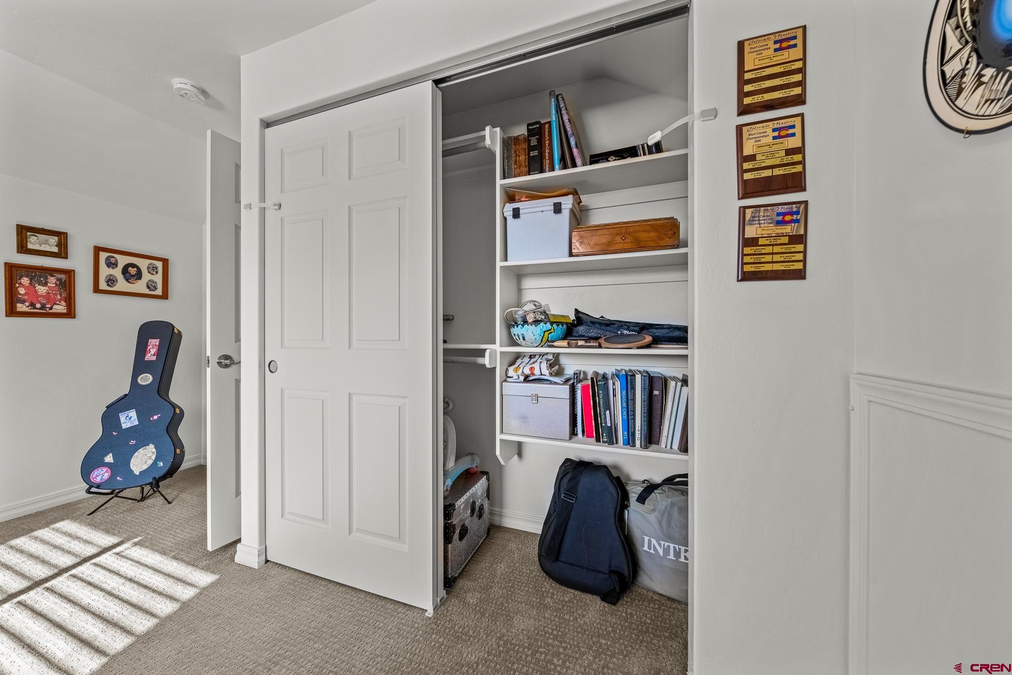 72 Cedar Ridge Way Durango, CO 81301 - Photo 20 of 33 a view of a bedroom with workspace and window