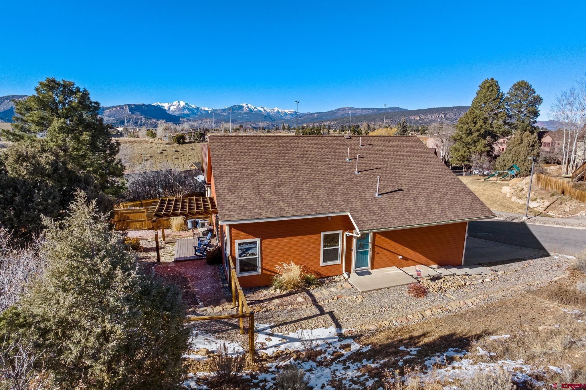 72 Cedar Ridge Way Durango, CO 81301 - Photo 25 of 33 a view of a house with a yard