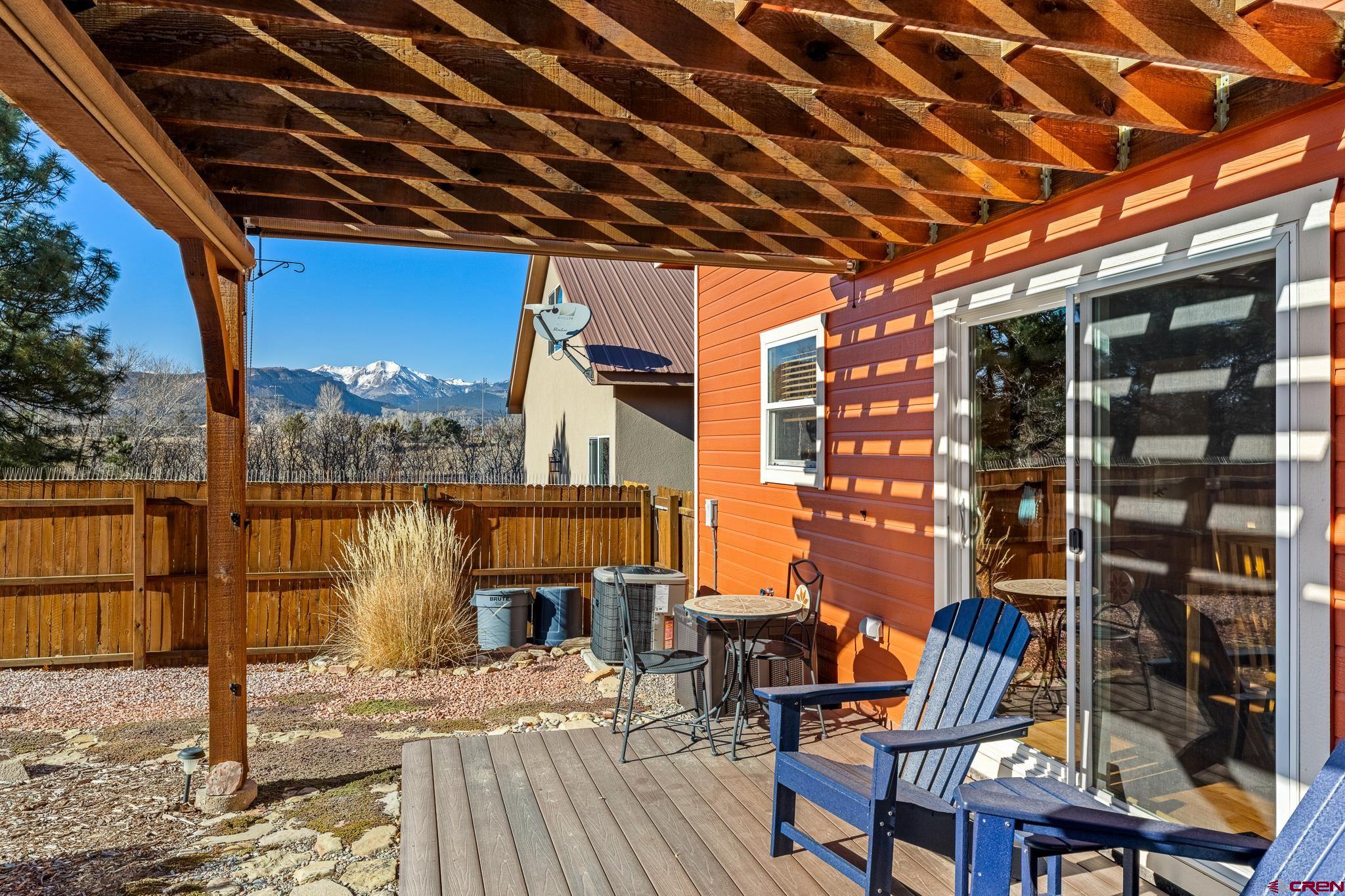 72 Cedar Ridge Way Durango, CO 81301 - Photo 27 of 33 a view of balcony with wooden floor and outdoor seating