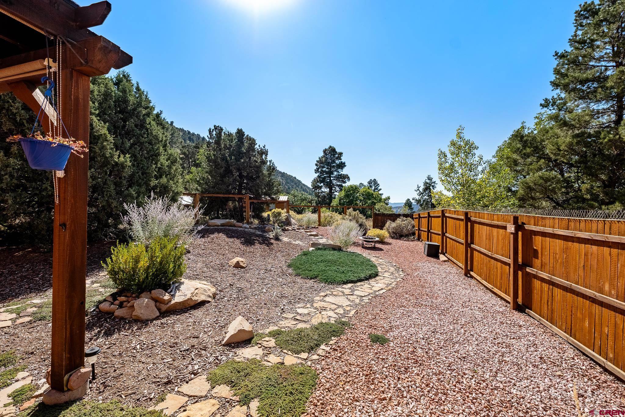 72 Cedar Ridge Way Durango, CO 81301 - Photo 31 of 33 a view of a backyard with sitting area