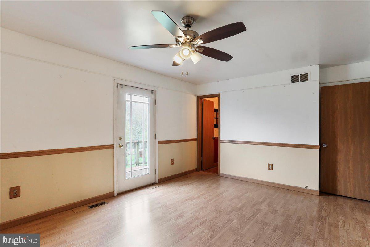 4045 North Stone Road Taneytown, MD 21787 - Photo 15 of 45 a view of an empty room with a window