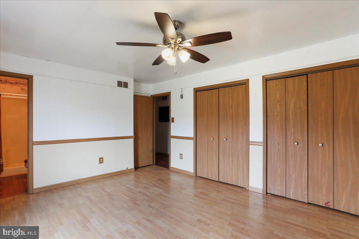4045 North Stone Road Taneytown, MD 21787 - Photo 16 of 45 a view of an empty room and wooden floor
