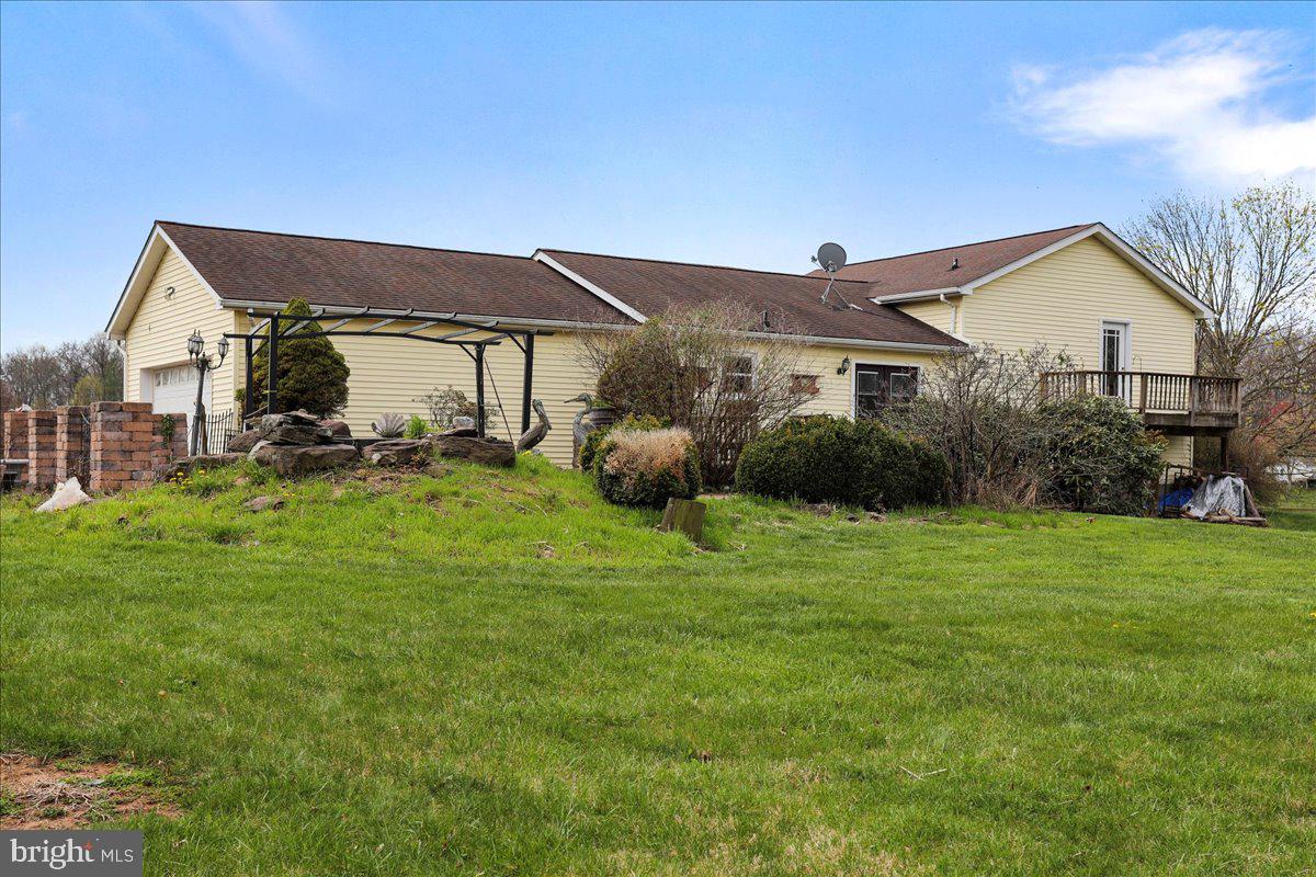 4045 North Stone Road Taneytown, MD 21787 - Photo 31 of 45 a front view of house with yard and outdoor seating