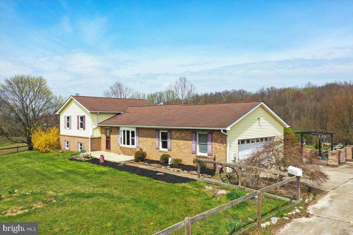4045 North Stone Road Taneytown, MD 21787 - Photo 4 of 45 a front view of house with yard and green space