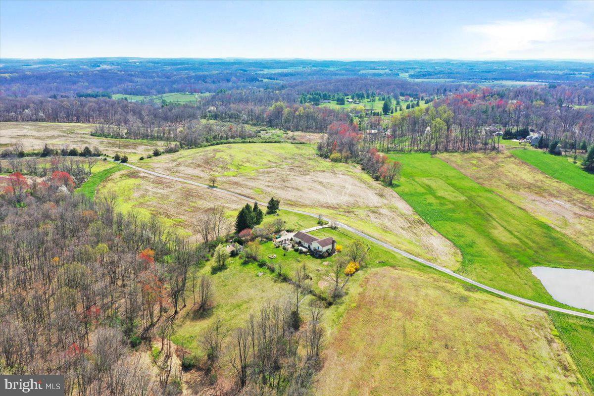 4045 North Stone Road Taneytown, MD 21787 - Photo 42 of 45 a view of a swimming pool and mountains in the background