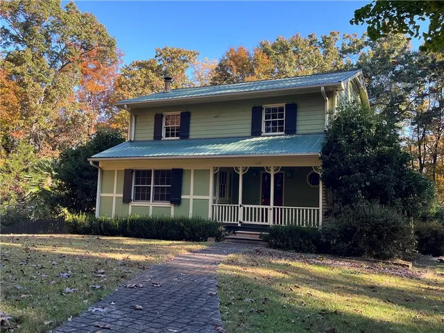 a view of a playground with basketball court