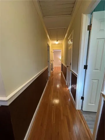 a kitchen with granite countertop a sink stove and cabinets