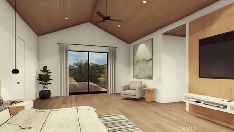 a living room with a couch and a flat screen tv