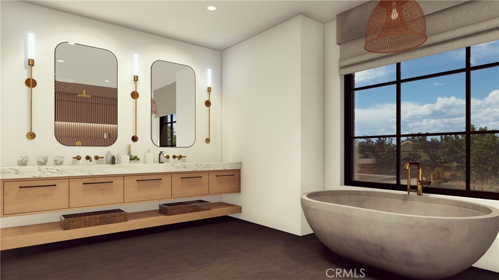 1501 Cumberland Lane Newport Beach, CA 92660 - Photo 13 of 29 a bathroom with a tub and a double vanity sink