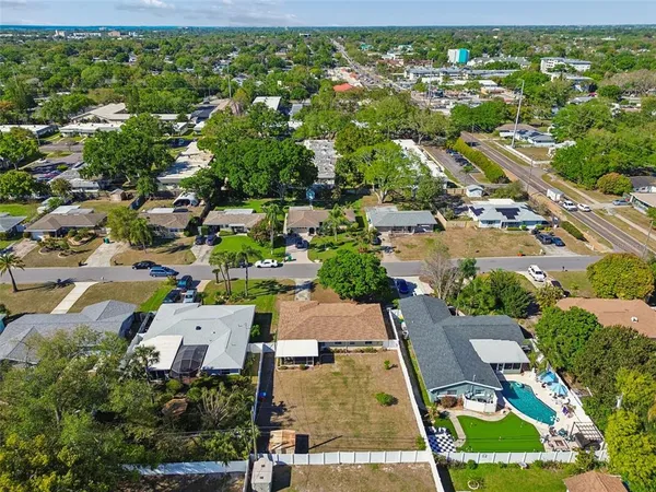 an aerial view of a house with a garden