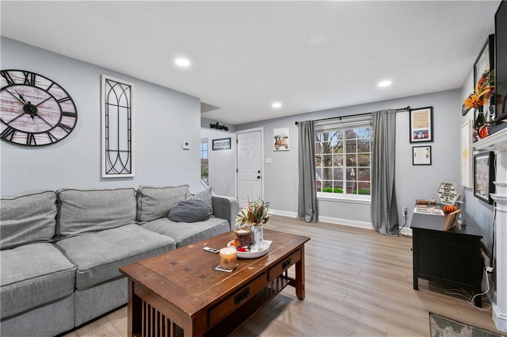 5300 Spring Valley Drive Pittsburgh, PA 15236 - Photo 4 of 25 a living room with furniture and wooden floor