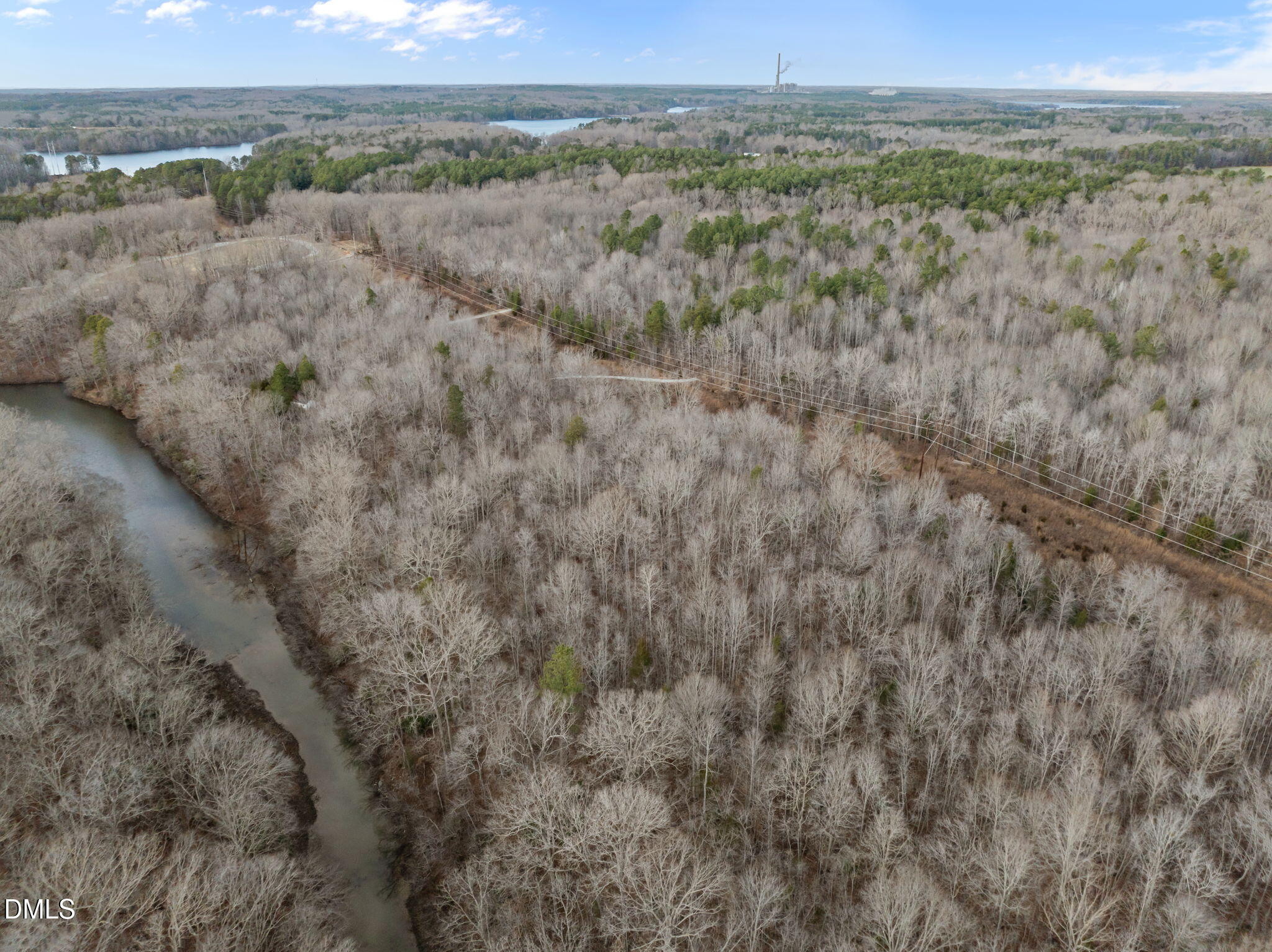 10.75-acre Neal's Store Road Roxboro, NC 27574 - Photo 5 of 17 a view of a field with trees in the background