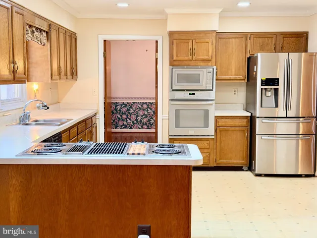 a view of a hardwood & staircase