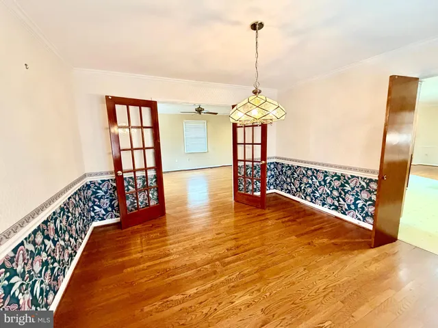 a bathroom with a toilet sink and shower