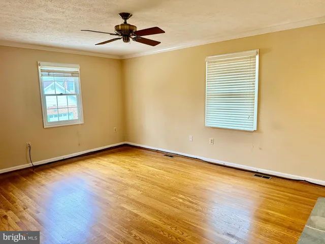 a view of a bathroom with a glass door shower