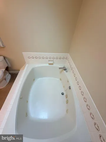 an empty room with a empty space and a window