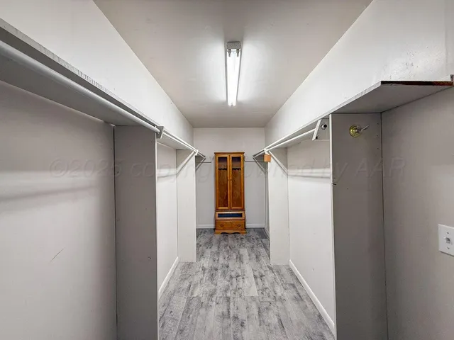 a bathroom with a shower and a shower