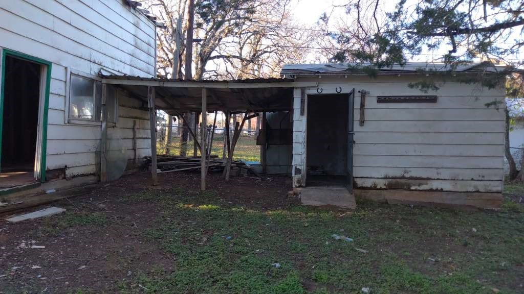 416 Live Oak Loop Whitney, TX 76692 - Photo 12 of 13 a view of a house with backyard and porch