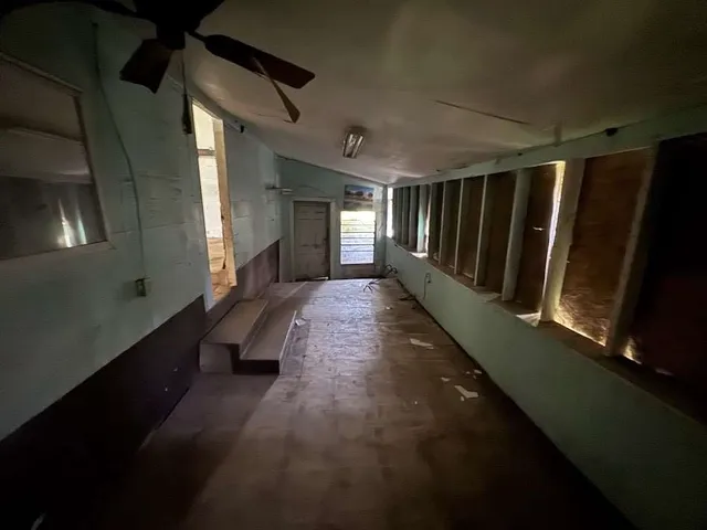 a view of hallway with stairs