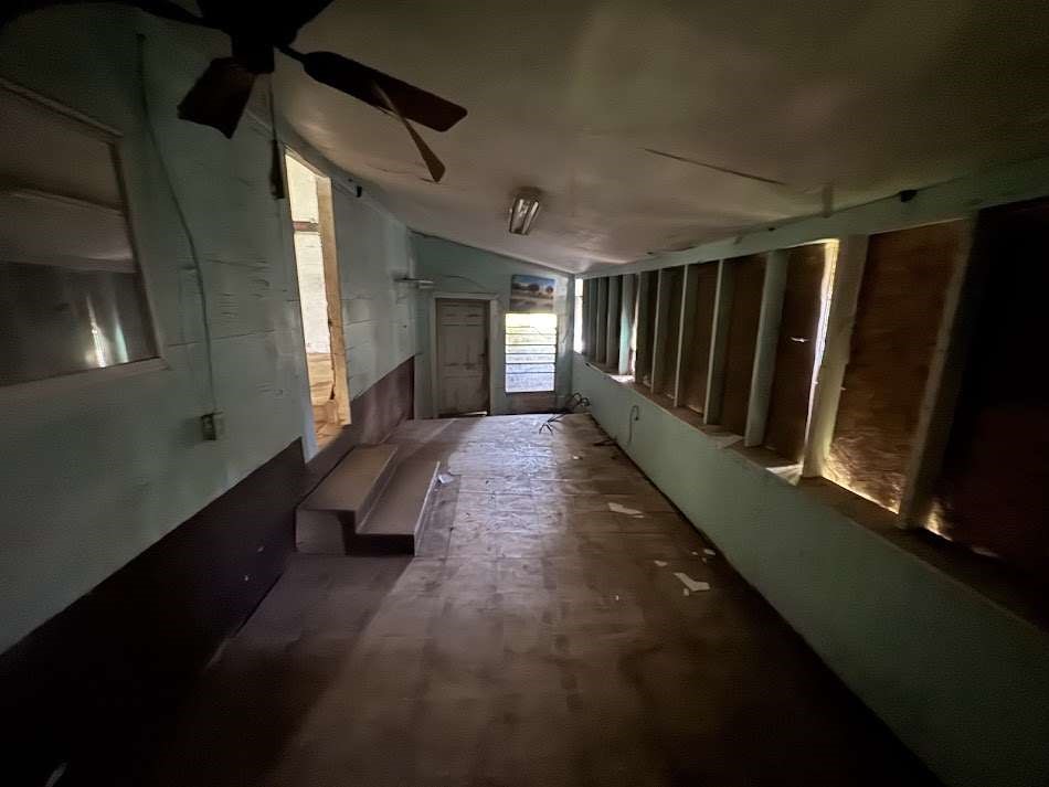416 Live Oak Loop Whitney, TX 76692 - Photo 10 of 13 a view of hallway with stairs