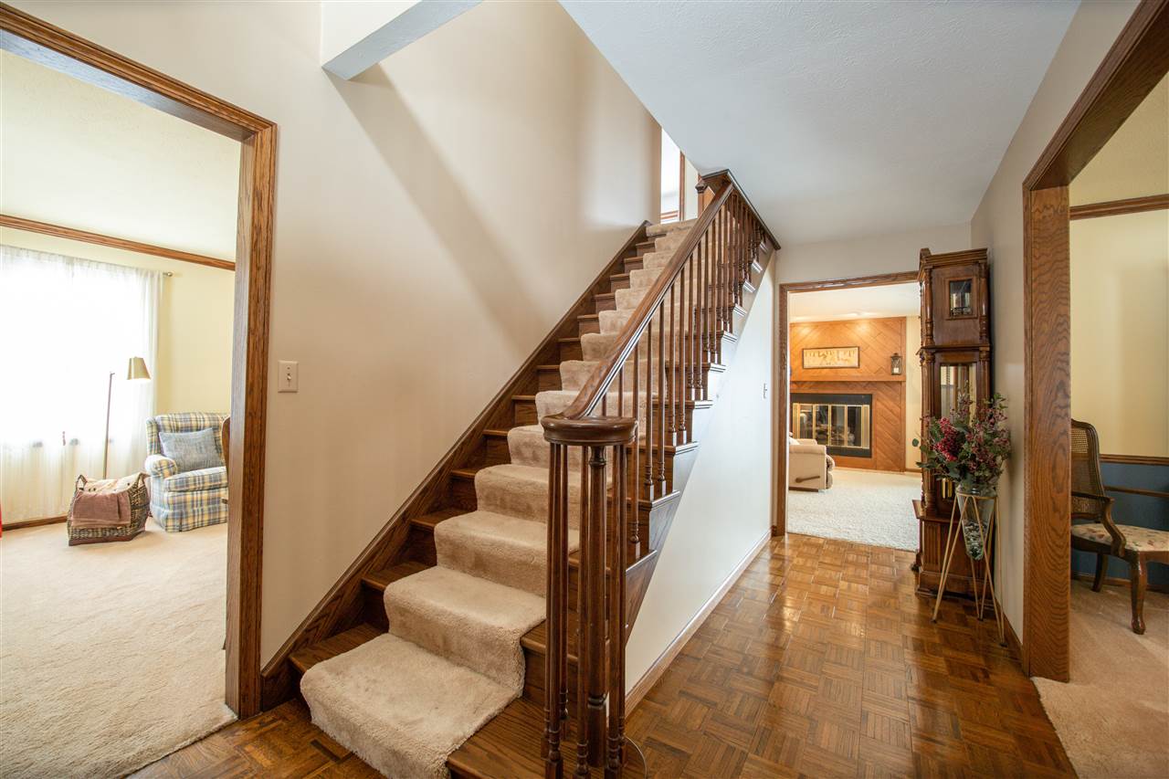 7339 East Wildwood Road Stillman Valley, IL 61084 - Photo 25 of 40 a view of entryway and hall with wooden floor