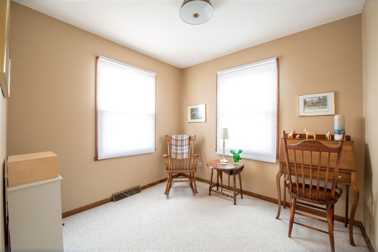 7339 East Wildwood Road Stillman Valley, IL 61084 - Photo 27 of 40 a living room with furniture and a window