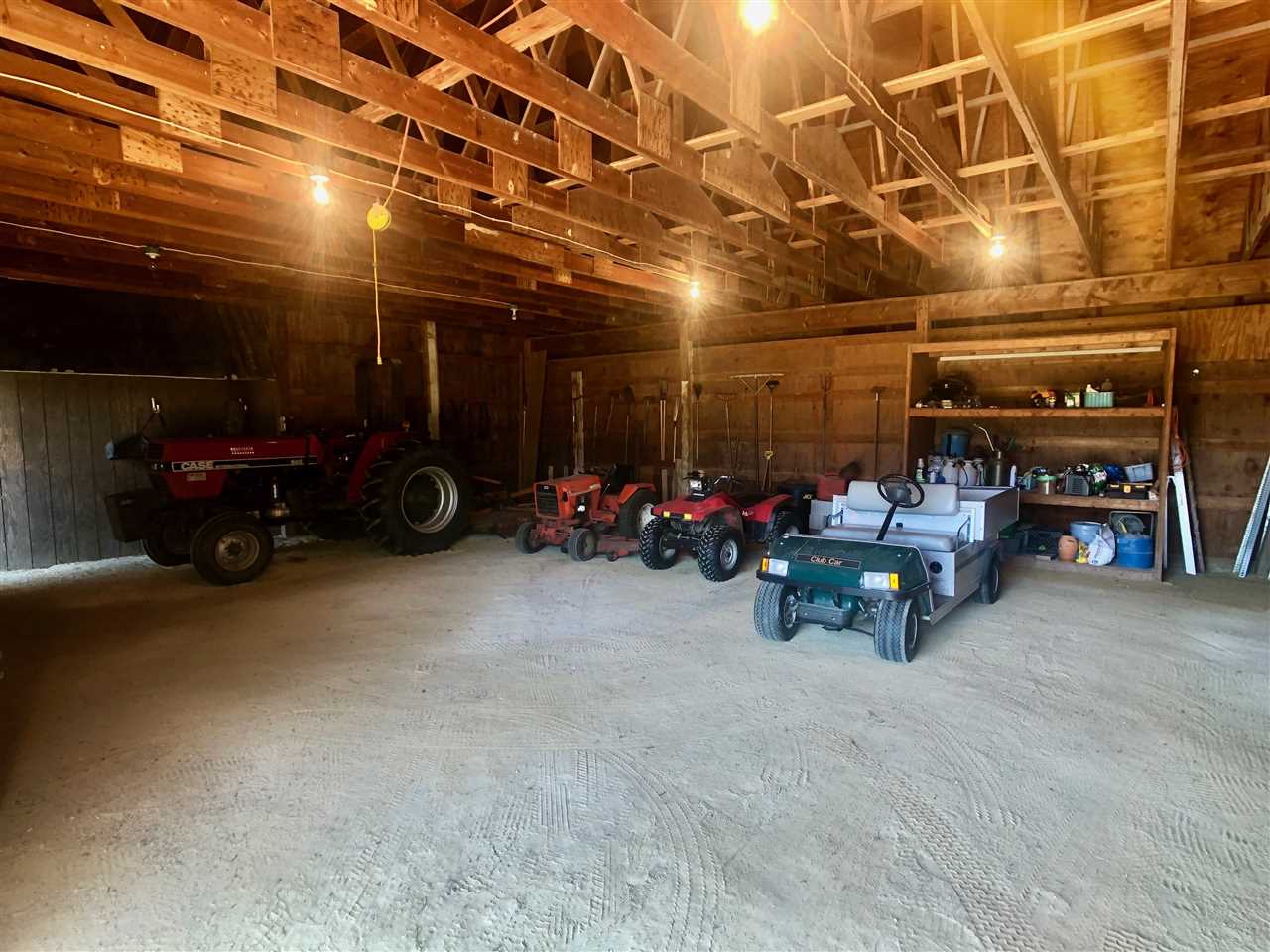 7339 East Wildwood Road Stillman Valley, IL 61084 - Photo 35 of 40 a view of a garage with a table and chairs