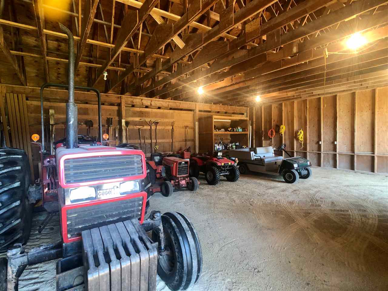 7339 East Wildwood Road Stillman Valley, IL 61084 - Photo 36 of 40 a view of a garage with parked cars