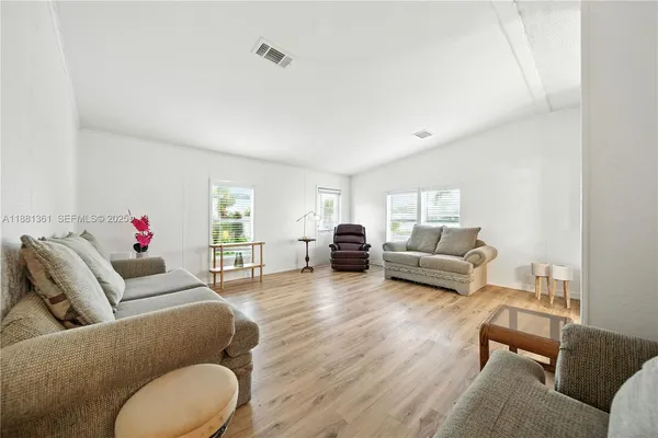 a living room with furniture and a couch