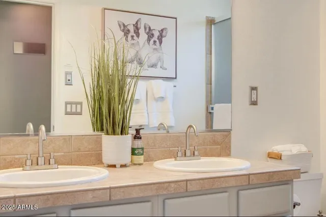 a living room with a couch and a flat screen tv
