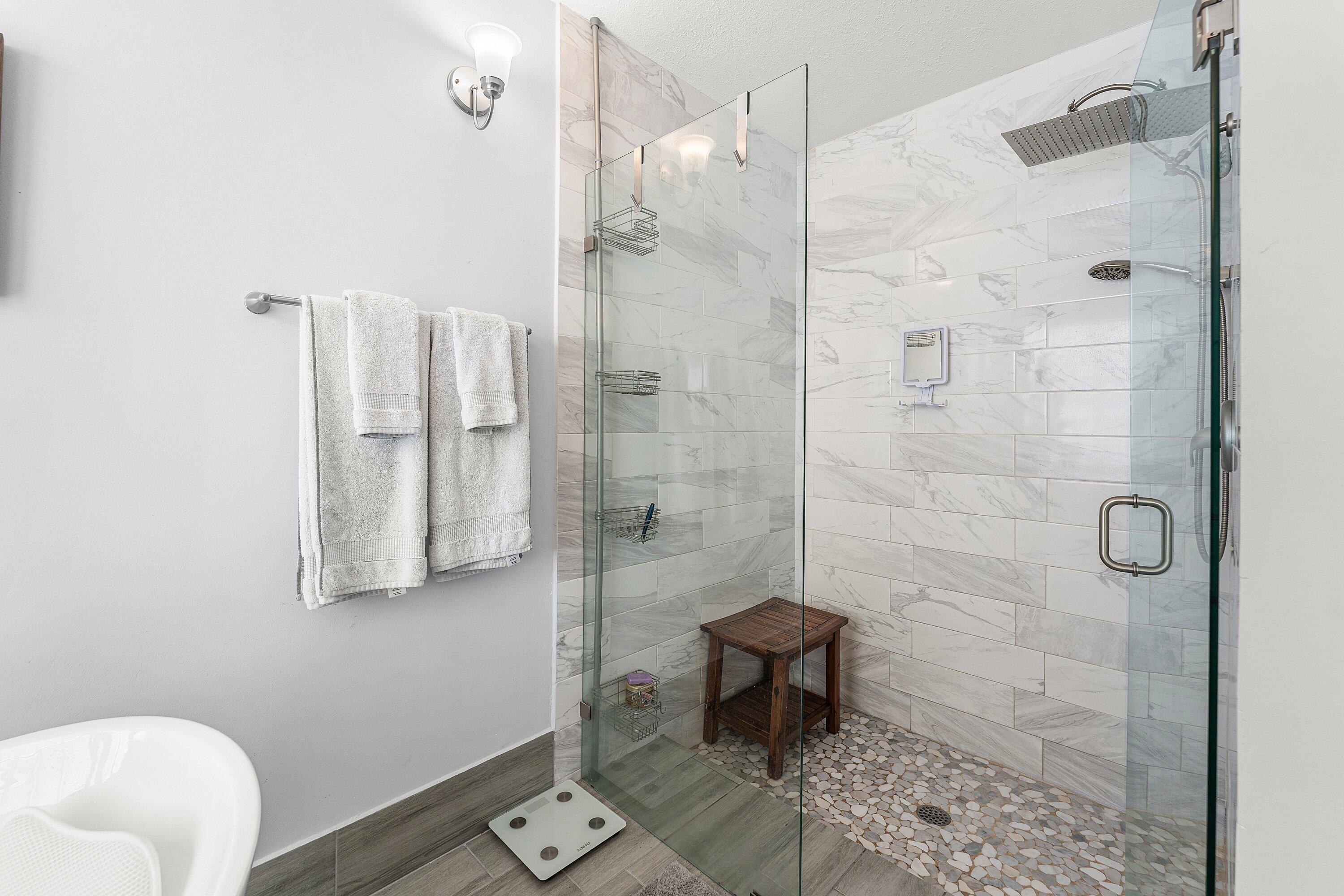 7346 Michigan Isle Road Lake Worth, FL 33467 - Photo 21 of 44 a bathroom with a shower toilet and sink