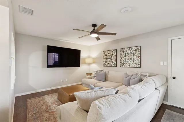 a kitchen with granite countertop a sink and a stove top oven
