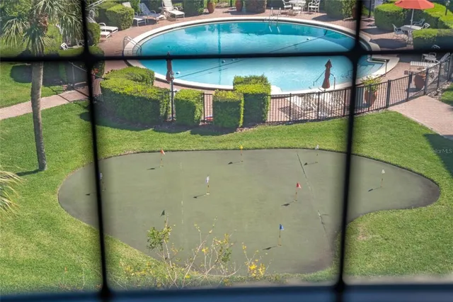 a view of a backyard with plants