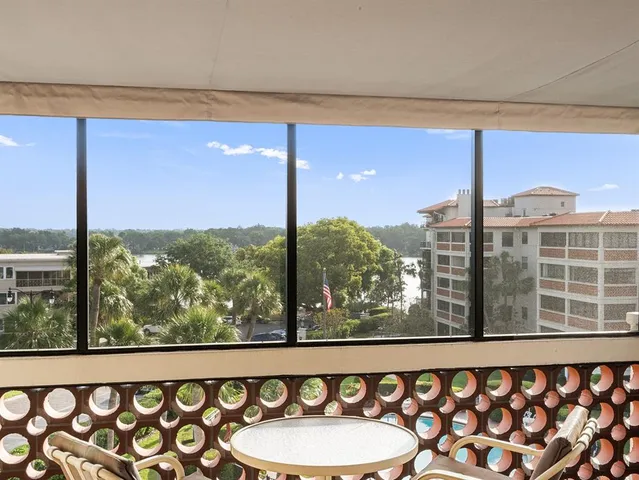 a kitchen with a table and chairs in it