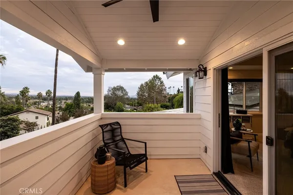a view of a two chair in the balcony