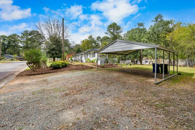 a view of a park with swings and slides