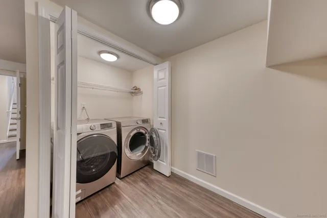 a view of washer and dryer in a utility room