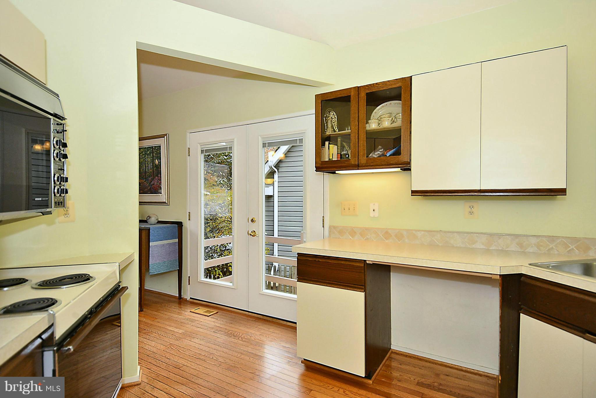 10040 Pratt Place Silver Spring, MD 20910 - Photo 16 of 26 Kitchen with French Doors to Side Yard
