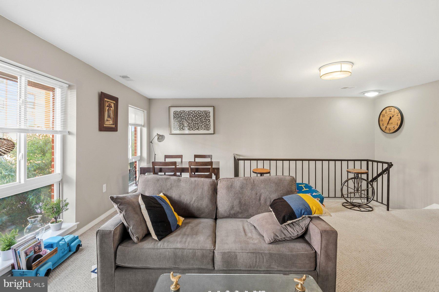 642 South Charles Street, Unit R 22 Baltimore, MD 21230 - Photo 15 of 26 a reading room with furniture and wooden floor