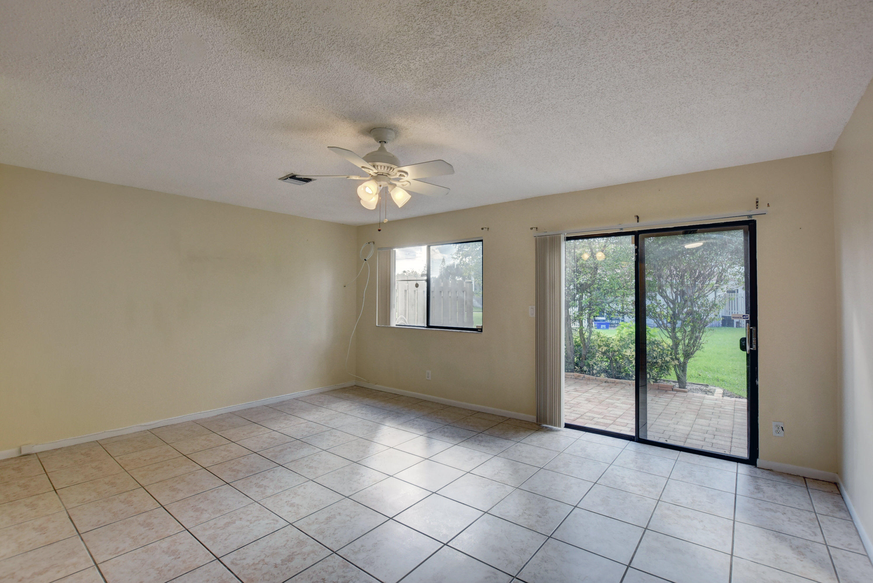3603 Inlet Circle Greenacres, FL 33463 - Photo 12 of 34 en empty room with windows
