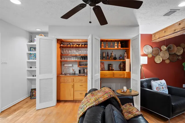 a view of a cafe with sitting area