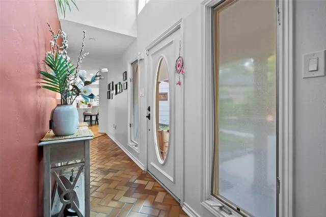 a view of a livingroom with furniture and a fireplace